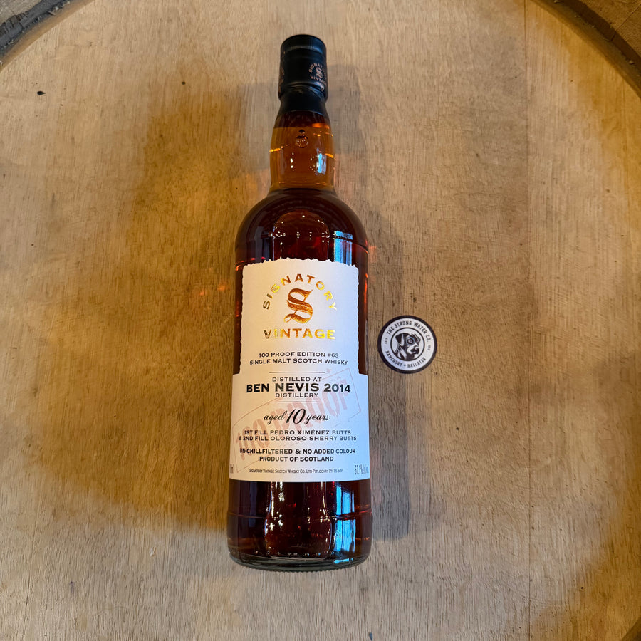 Bottle of Ben Nevis 2014 whisky on a wooden barrel