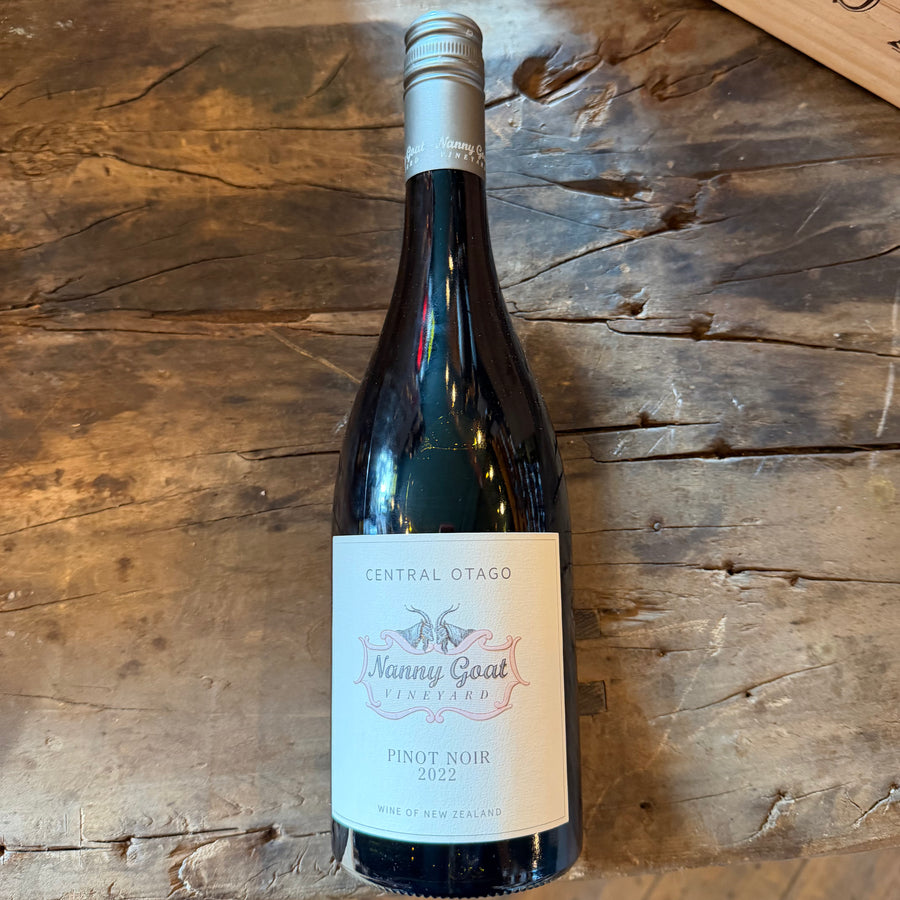 Wine bottle labeled 'Nanny Goat' on a wooden surface - Wine shop Ballater